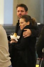 HILARY SWANK and Philip Schneider at LAX Airport in Los Angeles 12/17/2017