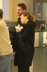 HILARY SWANK and Philip Schneider at LAX Airport in Los Angeles 12/17/2017