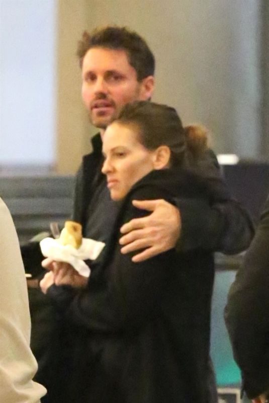 HILARY SWANK and Philip Schneider at LAX Airport in Los Angeles 12/17/2017