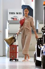 IRINA SHAYK on the Set of a Photoshoot at Miami International Airport 12/02/2017