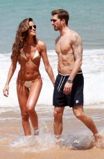 IZABEL GOULART in Bikini and Kevin Trapp at a Beach in Brazil 12/25/2017