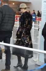 JENNIFER LAWRENCE with Her Dog at JFK Airport in New York 12/30/2017