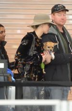 JENNIFER LAWRENCE with Her Dog at JFK Airport in New York 12/30/2017