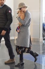 JENNIFER LAWRENCE with Her Dog at JFK Airport in New York 12/30/2017