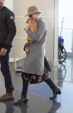 JENNIFER LAWRENCE with Her Dog at JFK Airport in New York 12/30/2017