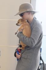JENNIFER LAWRENCE with Her Dog at JFK Airport in New York 12/30/2017
