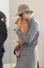 JENNIFER LAWRENCE with Her Dog at JFK Airport in New York 12/30/2017