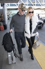 KATE BOSWORTH and Michael Polish at LAX Airport in Los Angeles 12/08/2017