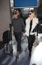 KATE BOSWORTH and Michael Polish at LAX Airport in Los Angeles 12/08/2017
