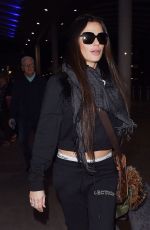 KATIE PRICE at Heathrow Airport in London 12/01/2017