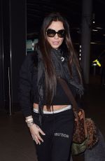 KATIE PRICE at Heathrow Airport in London 12/01/2017