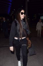 KATIE PRICE at Heathrow Airport in London 12/01/2017