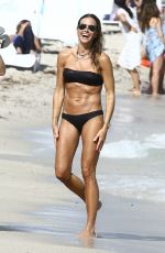 KELLY BENSIMON in Bikinis at a Beach in Miami 12/27/2017