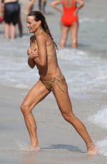 KELLY BENSIMON in Bikinis at a Beach in Miami 12/27/2017