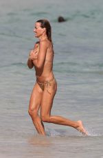 KELLY BENSIMON in Bikinis at a Beach in Miami 12/27/2017