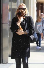KELLY TURHERFORD Out for Lunch with Her Dog in Beverly Hills 12/02/2017