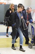 KRSITEN STEWART and STELLA MAXWELL at JFK Airport in New York 12/08/2017