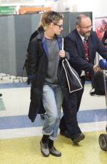 KRSITEN STEWART and STELLA MAXWELL at JFK Airport in New York 12/08/2017