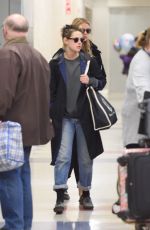 KRSITEN STEWART and STELLA MAXWELL at JFK Airport in New York 12/08/2017