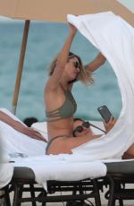 LAURA STONER in Bikini at a Beach in Miami 12/18/2017