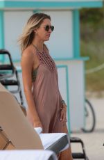 LAURA STONER in Bikini at a Beach in Miami 12/18/2017