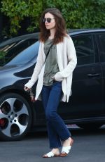 LILY COLLINS Out and About in Hollywood 12/16/2017