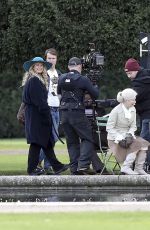 LILY JAMES with Broken Toe on the Set of Mamma Mia 2 in London 11/30/2017