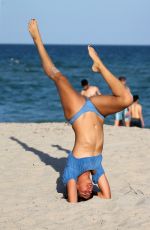 LUCY ARAGON in Bikini Does Yoga at a Beach in Miami 12/08/2017