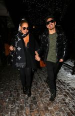 MARIAH CAREY and Bryan Tanaka Shopping at Louis Vuitton Store in Aspen 12/23/2017