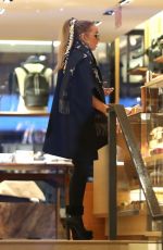 MARIAH CAREY and Bryan Tanaka Shopping at Louis Vuitton Store in Aspen 12/23/2017