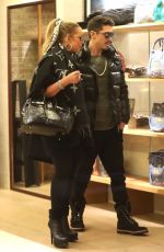 MARIAH CAREY and Bryan Tanaka Shopping at Louis Vuitton Store in Aspen 12/23/2017