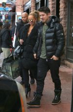 MARIAH CAREY and Bryan Tanaka Shopping at Louis Vuitton Store in Aspen 12/23/2017
