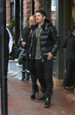MARIAH CAREY and Bryan Tanaka Shopping at Louis Vuitton Store in Aspen 12/23/2017