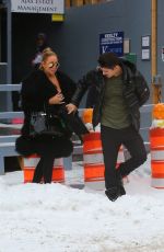 MARIAH CAREY and Bryan Tanaka Shopping at Louis Vuitton Store in Aspen 12/23/2017