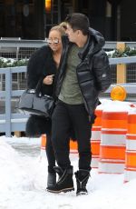 MARIAH CAREY and Bryan Tanaka Shopping at Louis Vuitton Store in Aspen 12/23/2017