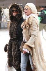 MELANIE GRIFFITH and GOLDIE HAWN Shopping at Cos Bar on Christmas Eve in Aspen 12/24/2017