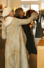 MELANIE GRIFFITH and GOLDIE HAWN Shopping at Cos Bar on Christmas Eve in Aspen 12/24/2017