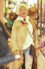 MELANIE GRIFFITH and GOLDIE HAWN Shopping at Cos Bar on Christmas Eve in Aspen 12/24/2017