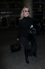 MELANIE GRIFFITH at Los Angeles International Airport 12/19/2017