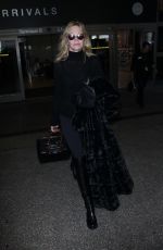 MELANIE GRIFFITH at Los Angeles International Airport 12/19/2017