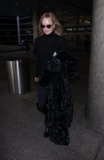 MELANIE GRIFFITH at Los Angeles International Airport 12/19/2017