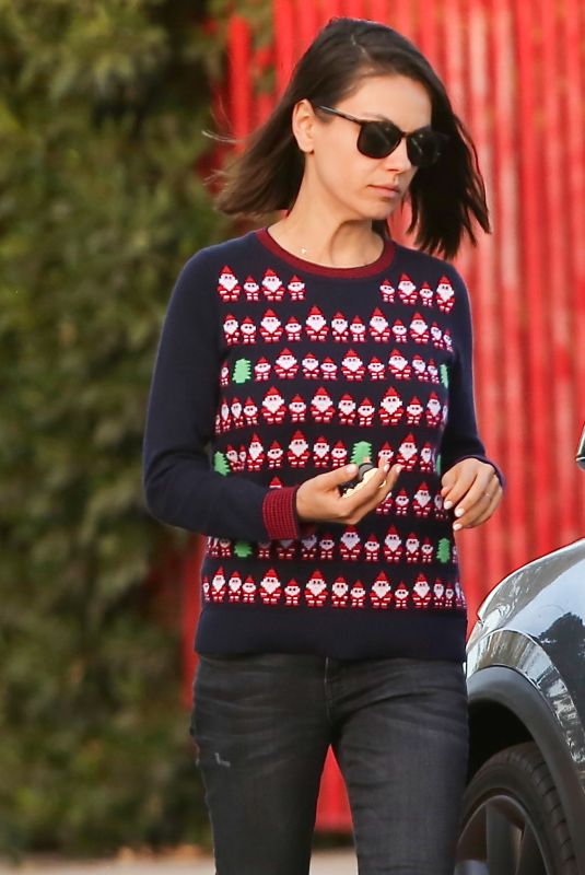 MILA KUNIS in Christmas Sweater Out in Los Angeles 12/08/2017