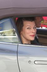 MILLA JOVOVICH Driving Out in Los Angeles 12/29/2017
