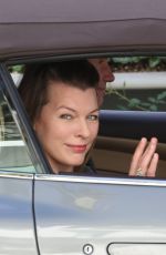 MILLA JOVOVICH Driving Out in Los Angeles 12/29/2017