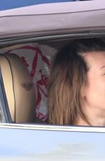 MILLA JOVOVICH Driving Out in Los Angeles 12/29/2017