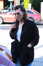 MILLA JOVOVICH Out Shopping in West Hollywood 12/22/2017