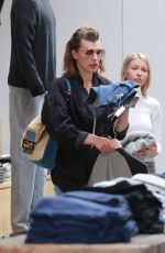 MILLA JOVOVICH Out Shopping in West Hollywood 12/22/2017