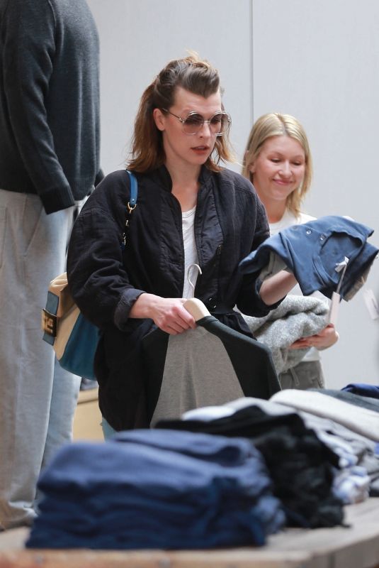 MILLA JOVOVICH Out Shopping in West Hollywood 12/22/2017