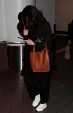 NINA DOBREV at LAX Airport in Los Angeles 12/04/2017