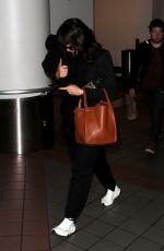 NINA DOBREV at LAX Airport in Los Angeles 12/04/2017